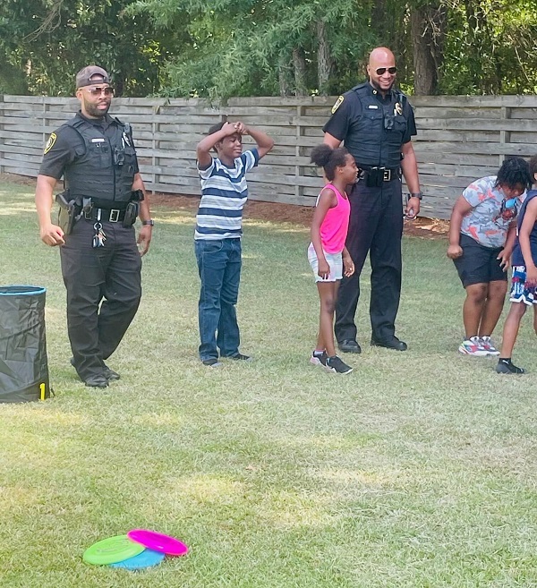 Police officers join the fun.