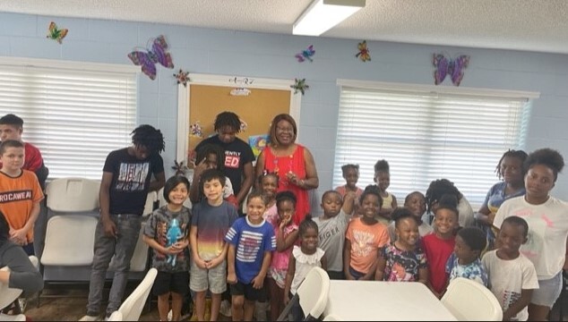 Group of people at the Jack Rountree Back to School Event.