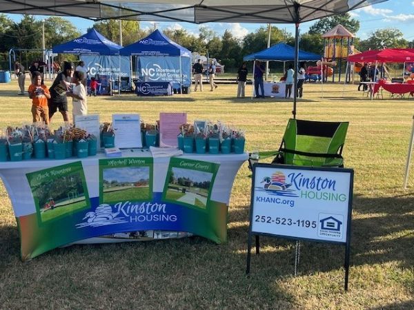 A view of the Kinston Housing table and sign.