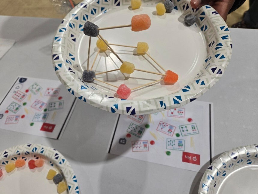 A shape made out of gummies and toothpicks.