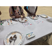  Two young kids building things with candy and toothpicks. 